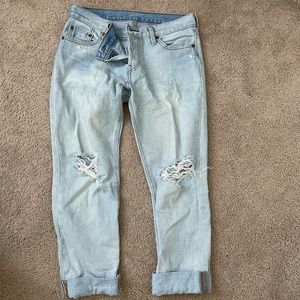 Light Washed, Distressed Levi's 501 (Size 25)